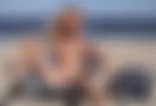 Slimgirl spreads at nudie beach